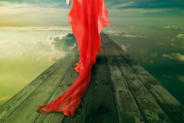 Silueta de una chica en un vestido rojo