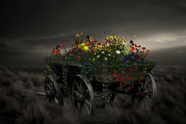 Ein Wagen mit grünem Gras und leuchtenden Blumen, die darauf wachsen, vor dem Hintergrund des Nachthimmels, der vom Mondlicht erleuchtet wird