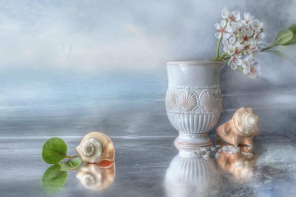 Antique vase and shell on a delicate blue background