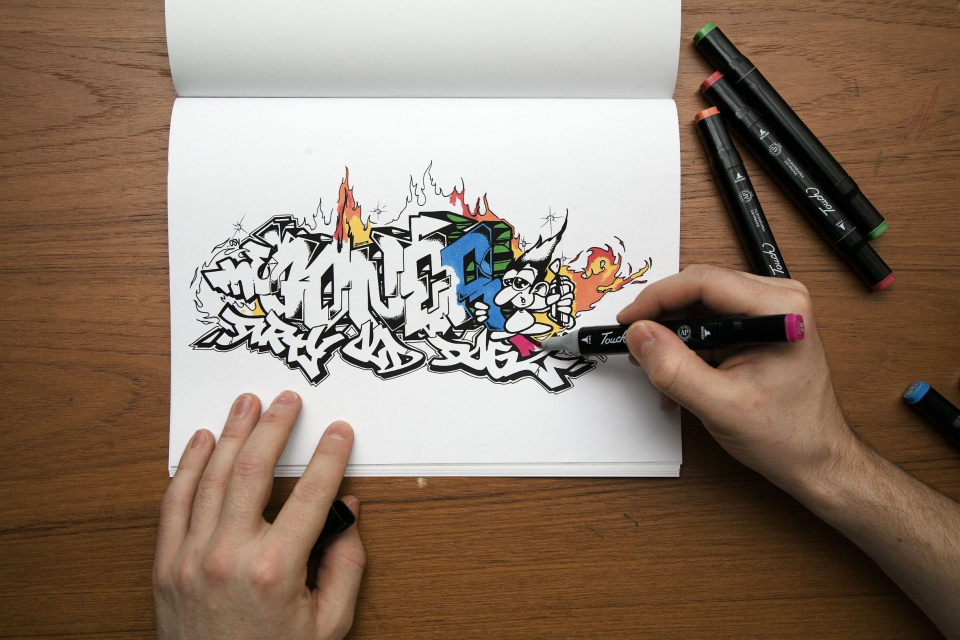 graffiti table hands marker