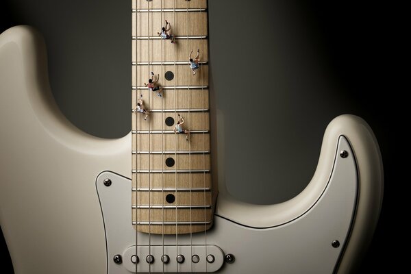 The wing of the white electronic guitar