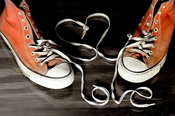 The sign of love from shoe laces