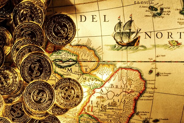 Monedas de oro en el mapa pirata