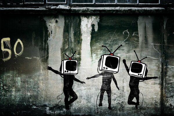 Graffiti of a TV on a gray wall