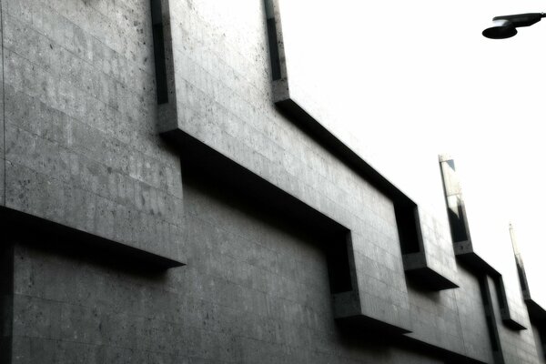 Textured gray wall of cubes and parallelograms