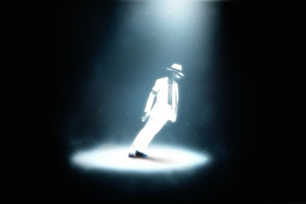Michael Jackson in a white suit spotlight white light