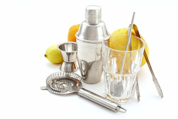 Dishes and tools for the bartender with lemon girl with wings