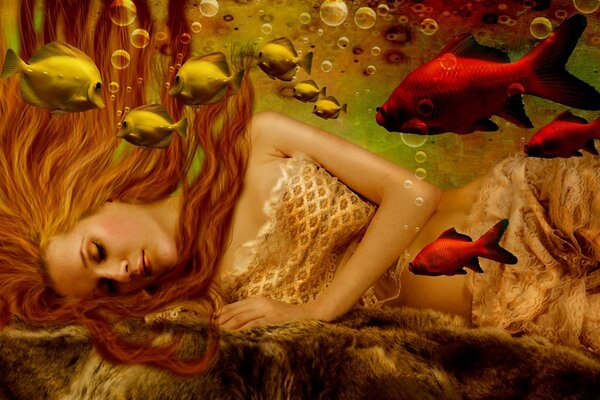 Sirena con i capelli rossi sott acqua con i pesci