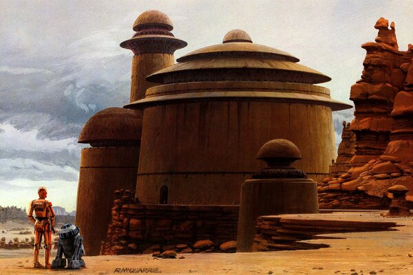 Robots from Star Wars on a desert planet