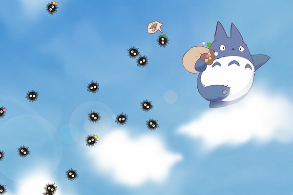 Anime. Susuwatari dans le ciel sur les nuages