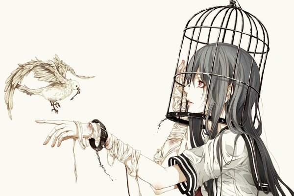 A girl drives a bird into a cage in a crude way
