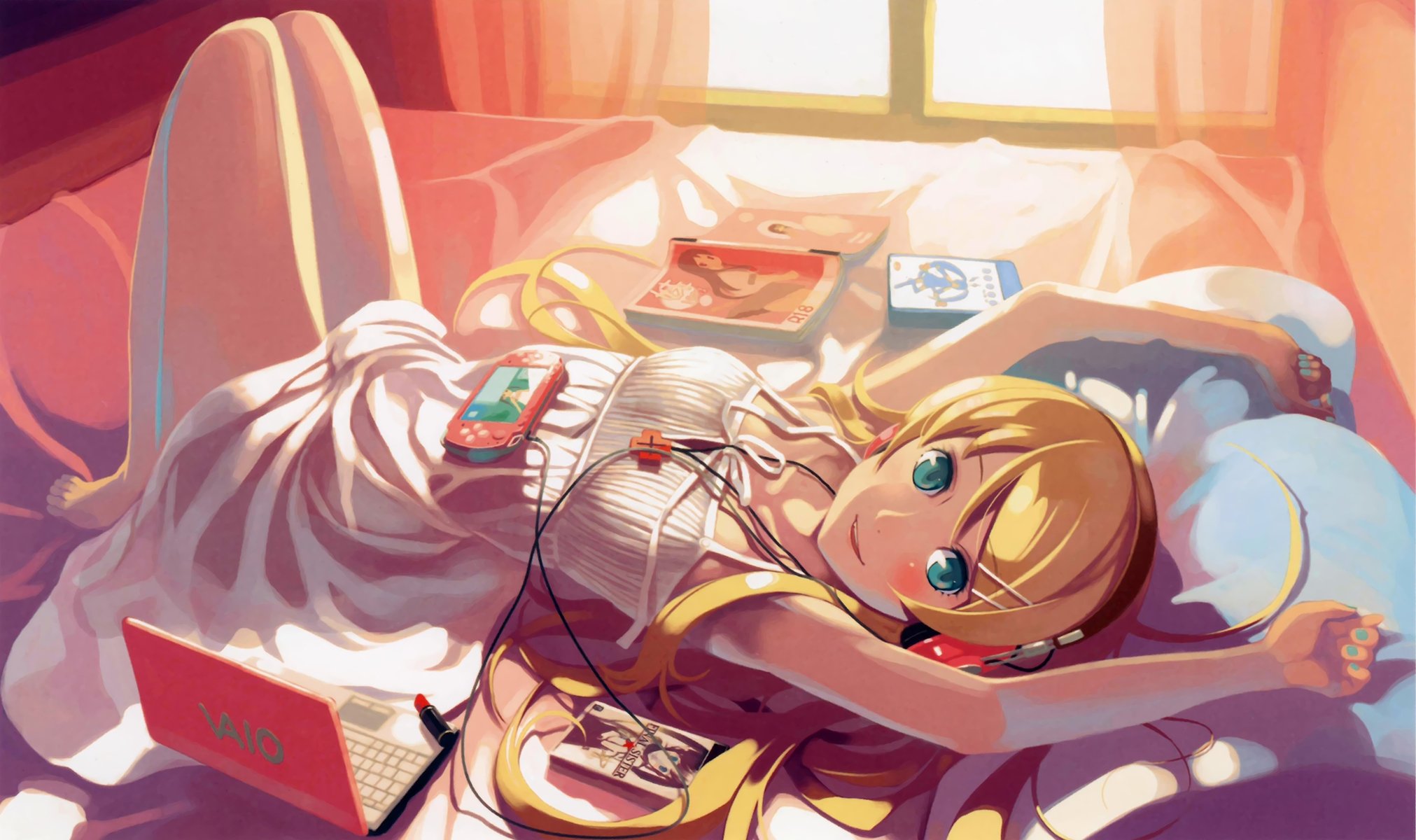 girl bed is notebook headphones video games book