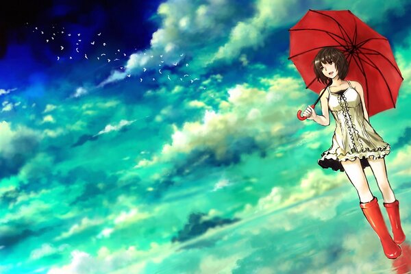 A girl with a red umbrella against the sky