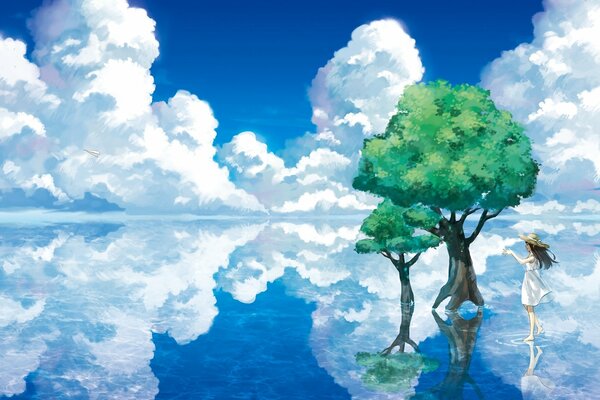 Reflection of a girl tree and clouds in the water