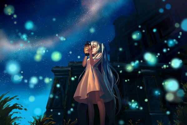 A girl at night with a lantern in the lights