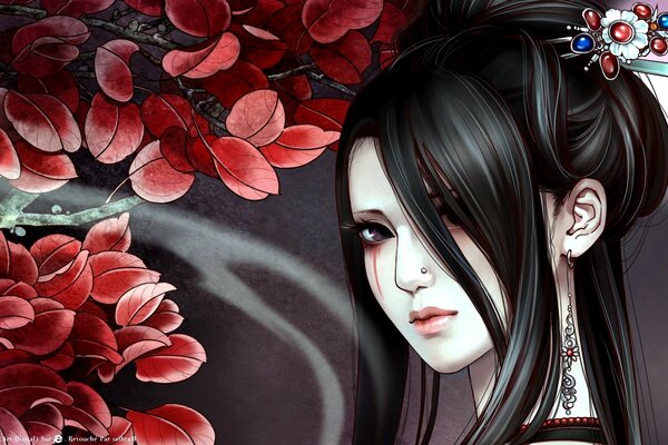 The girl s hairstyle has a hairpin on the background of leaves