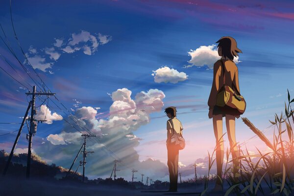 Makoto shinkai steht mit einem Mädchen auf der Straße und schaut in den Himmel