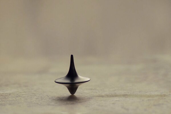 Spinning top on a light background