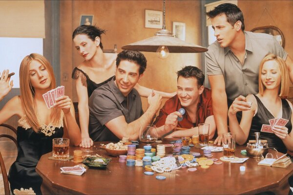 Friends play poker and drink