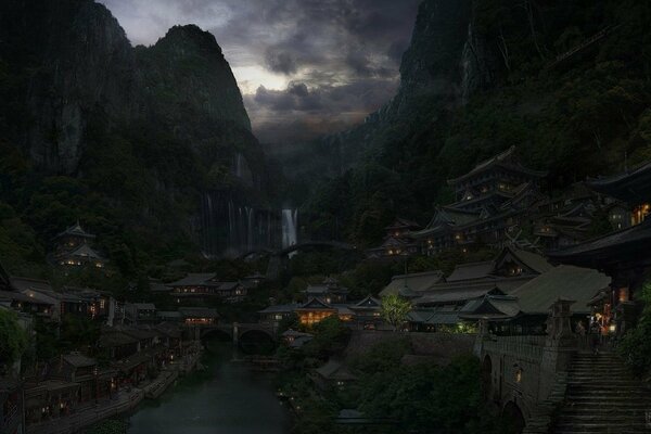 Houses on the mountains. Lights in houses. Cloudy sky