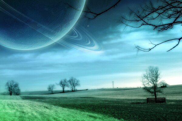 Saturn in the sky above the field