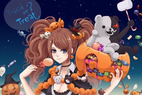 Chica en Halloween juega con calabaza y juguetes