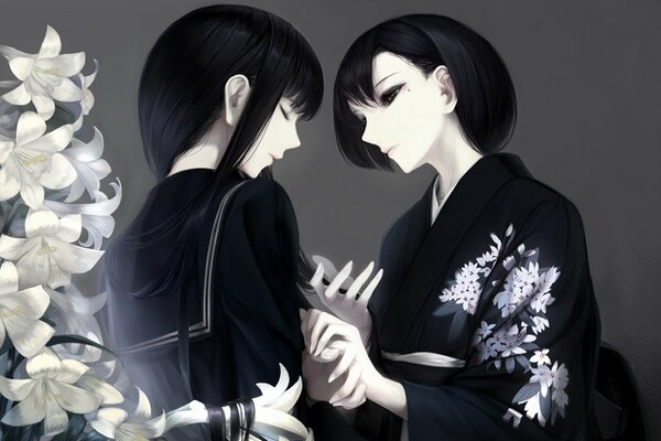 Girls in kimonos with lily flowers