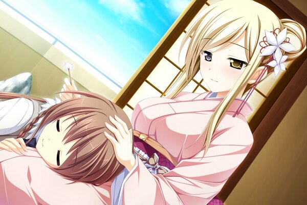 A girl sleeps on the lap of a girl in a kimono