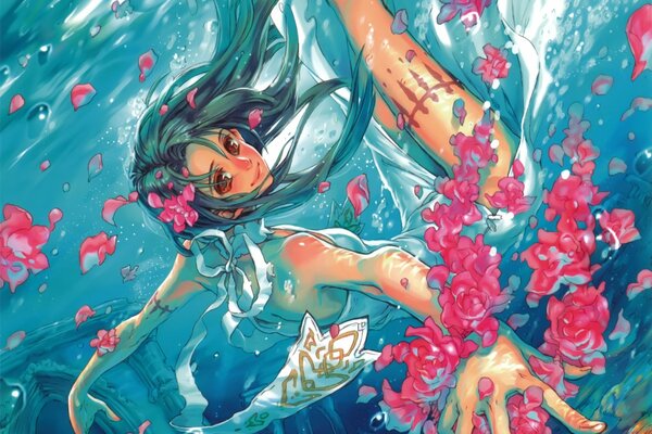 Dziewczyna pod wodą z płatkami róż