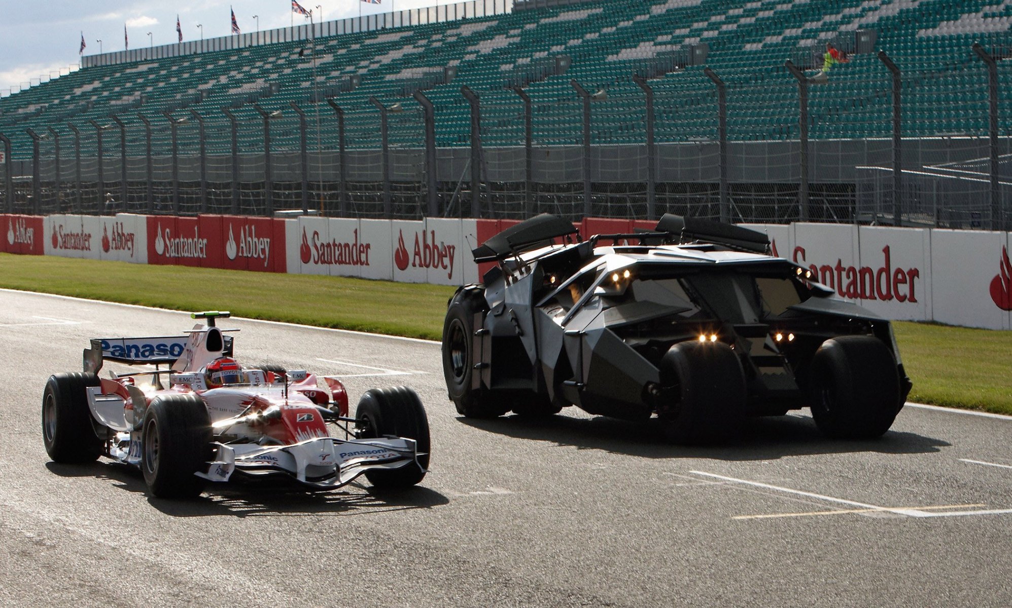 toyota f1 car with denote batmobile dark knight movie in silverstone