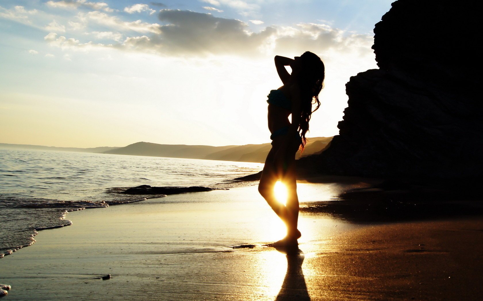 playa sombra puesta de sol figura chica