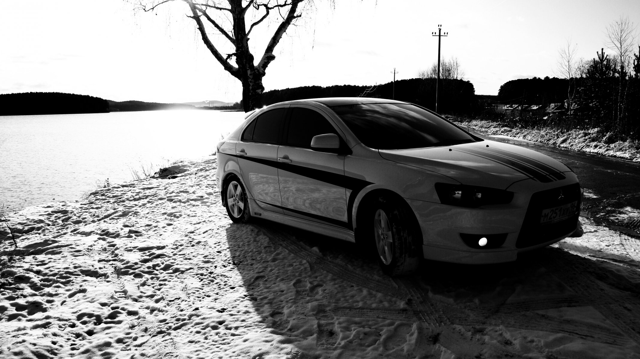 mitsubishi lancer x10 black and white snow tree trace