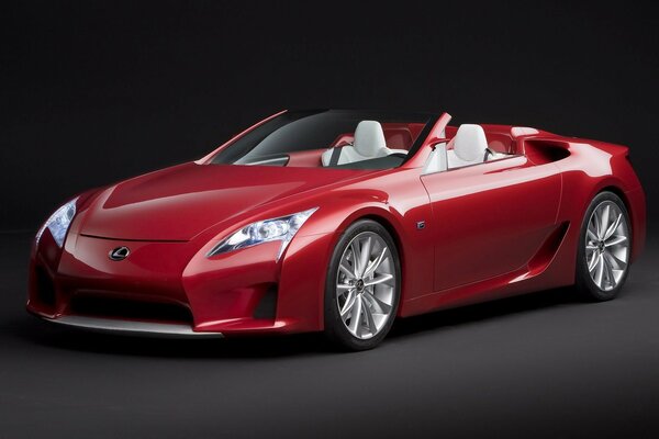 Red lexus lf-a concept car on a dark background