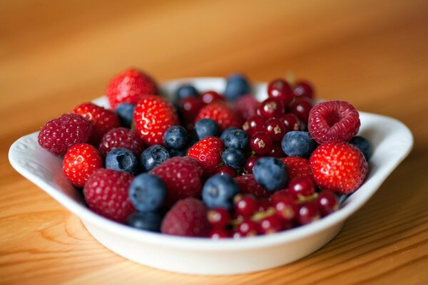 Berries from the garden: currants, raspberries, strawberries