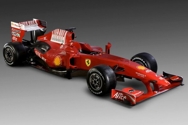 Voiture de formule 1 rouge sur fond gris