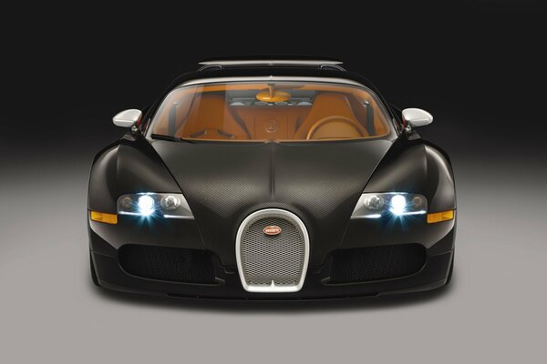 Bugatti art car with shining headlights and brown interior