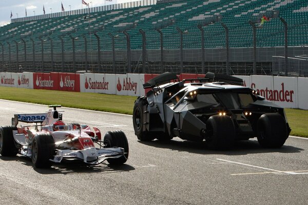 The batmobile from the movie The Dark Knight on the track