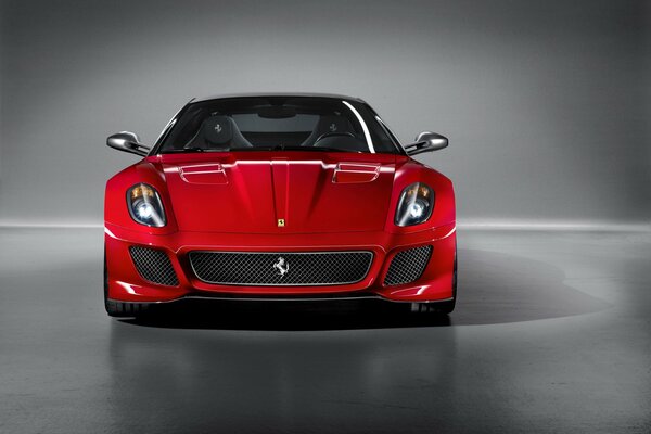 The scarlet Ferrari is waiting for its driver