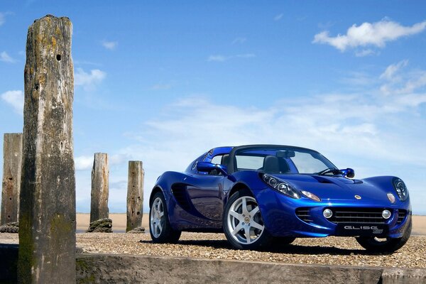 Blue Lotus Elise sports car on the sky background