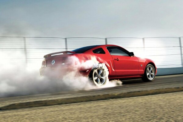 Red Ford with smoke from under the wheels