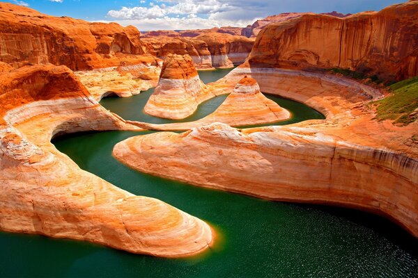 Orange landscape with mountains and water