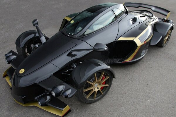 Sporty black car with gold inserts