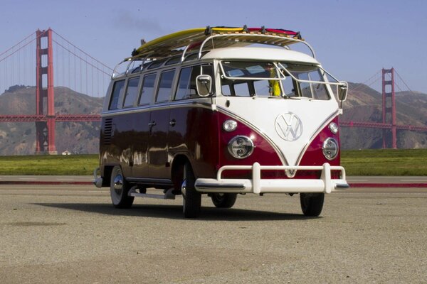 Stylish Volkswagen minibus on the background of the Golden Gate Bridge