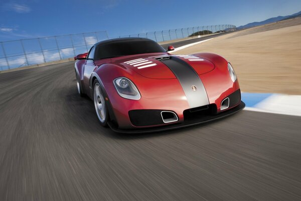 Beautiful photo of a red car on the road