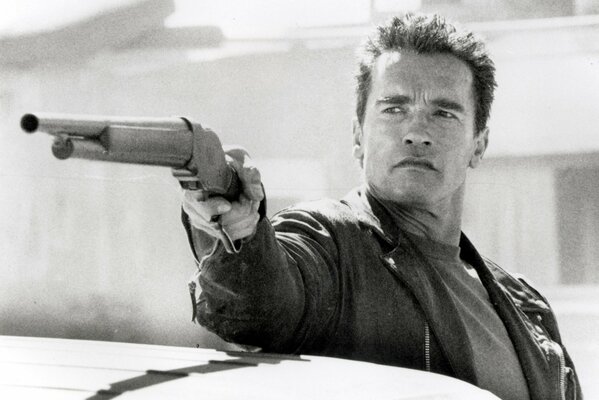 Terminator in human form took aim with a weapon