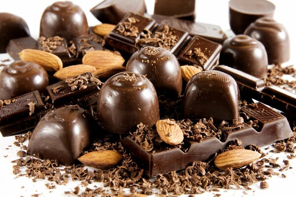 Chocolate candies with crumbs and almonds