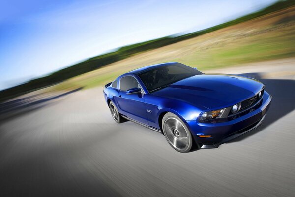 Ford Mustang at speed on the road