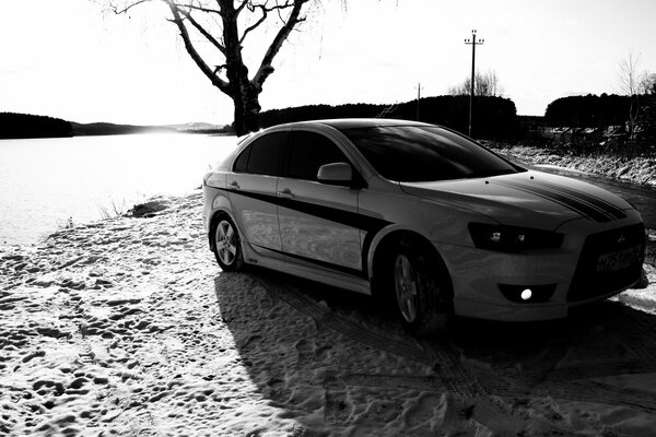 Mitsubishi Lancer in winter black and white