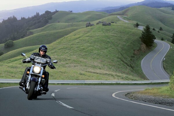 Harley rushes along the road serpentine