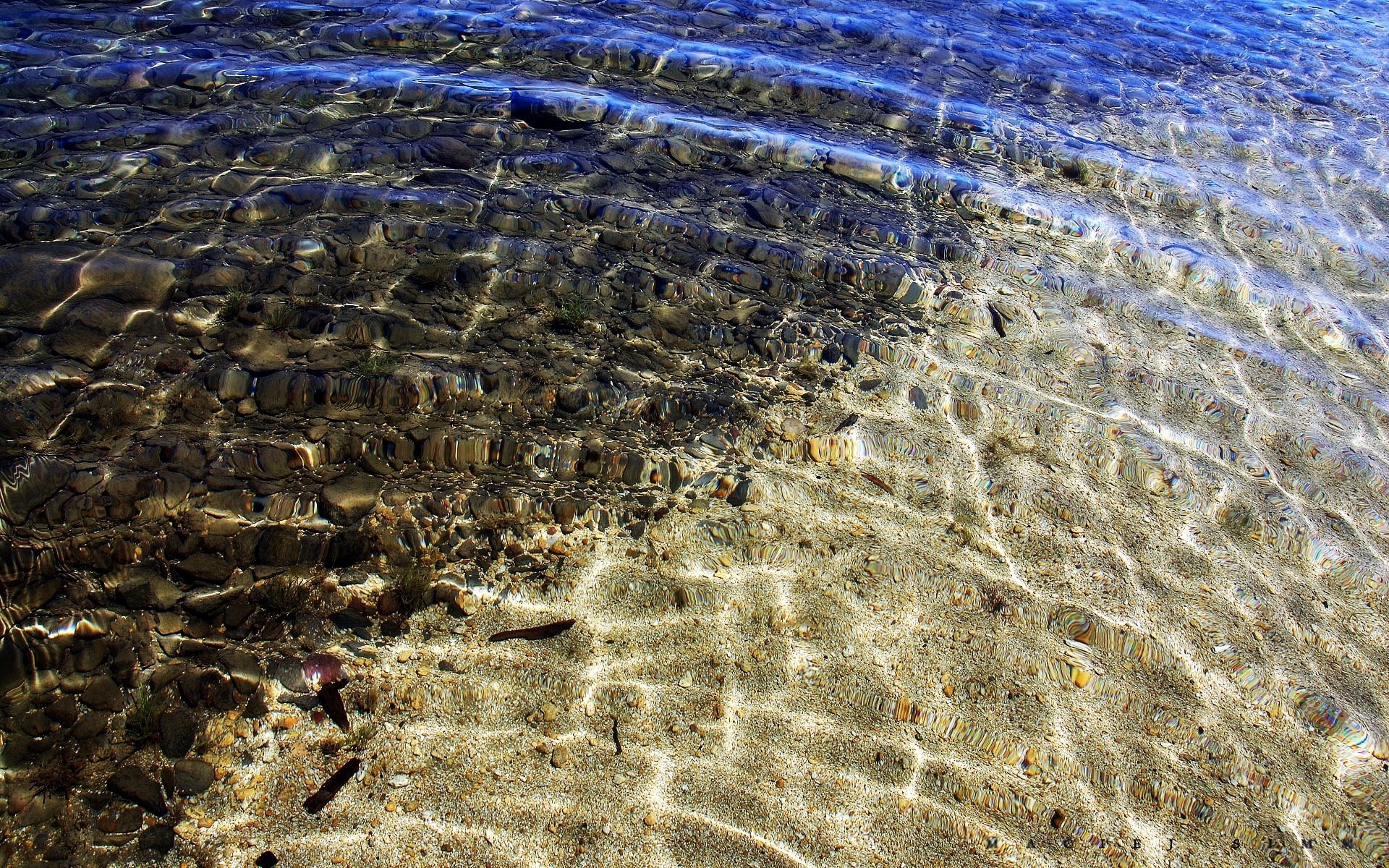 agua piedras arena